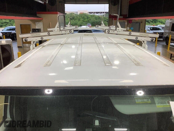 2013 Ford Econoline Cargo Commercial with VIN 1FTNE1EW9DDA61968, listed as a IAAI auction lot 42643038 with 121,719 mi miles and . Bid and sale history available at DreamBid. Image 32.