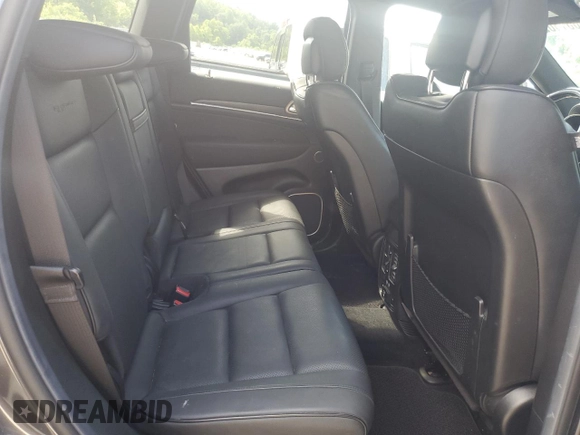 2014 Jeep Grand Cherokee Summit with VIN 1C4RJFJT4EC346946, listed as a Copart auction lot 60613025 with 50,565 mi miles and Salvage title. Bid and sale history available at DreamBid. Image 11.