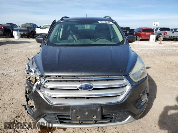 2018 Ford Escape SE with VIN 1FMCU9GD6JUB12810, listed as a Copart auction lot 82598864 with 138,640 mi miles and Salvage Title. Bid and sale history available at carsss.com. Image 5.