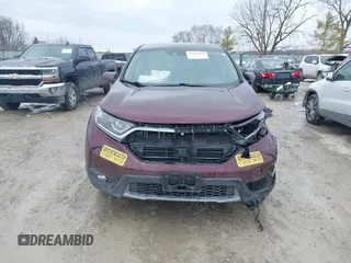 2018 Honda CR-V EX-L z VIN 2HKRW2H87JH698848, wystawiony jako IAAI lot #41624159 z przebiegiem 62 198 mil mil oraz . Historia ofert i sprzedaży dostępna na DreamBid. Obrazek 12.