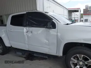 2020 Chevrolet Colorado 2WD Z71 with VIN 1GCGSDEN2L1159458, listed as a IAAI auction lot 42412924 with 90,011 mi miles and . Bid and sale history available at DreamBid. Image 6.