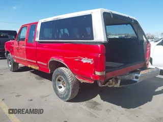 1996 Ford F-150 with VIN 1FTEX14N4TKA35971, listed as a IAAI auction lot 41744323 with 187,572 mi miles. Bid and sale history available at carsss.com. Image 3.