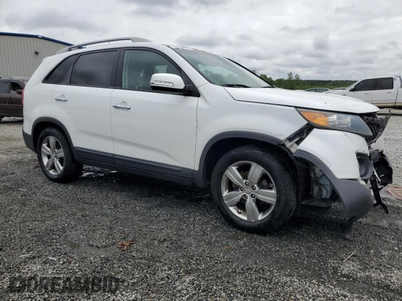 2012 Kia Sorento EX z VIN 5XYKU4A20CG301970, wystawiony jako Copart lot #54360795 z przebiegiem 208 616 mil mil oraz Szkoda całkowita • Salvage title. Historia ofert i sprzedaży dostępna na DreamBid. Obrazek 4.