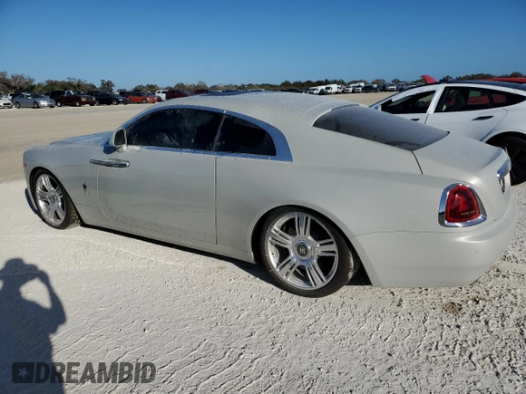 2015 Rolls-Royce Wraith z VIN SCA665C52FUX85269, wystawiony jako Copart lot #77326374 z przebiegiem Nie podano mil oraz Szkody całkowita. Historia ofert i sprzedaży dostępna na DreamBid. Obrazek 2.