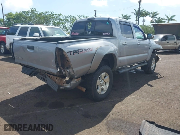 2014 Toyota Tacoma with VIN 3TMLU4EN3EM159080, listed as a IAAI auction lot 41809259 with 113,950 mi miles and . Bid and sale history available at DreamBid. Image 4.