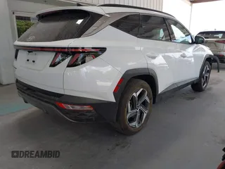 2024 Hyundai Tucson Limited z VIN 5NMJE3DE3RH398587, wystawiony jako IAAI lot #42132879 z przebiegiem 52 182 mil mil oraz . Historia ofert i sprzedaży dostępna na DreamBid. Obrazek 4.