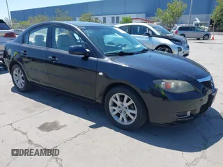 2008 Mazda 3 i Touring *Ltd Avail with VIN JM1BK12G081877189, listed as a IAAI auction lot 42147537 with 166,780 mi miles. Bid and sale history available at carsss.com. Image 1.