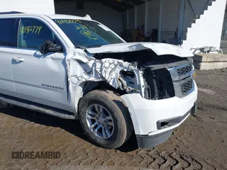 2016 Chevrolet Suburban LT with VIN 1GNSKHKCXGR206948, listed as a IAAI auction lot 41842774 with 190,935 mi miles. Bid and sale history available at carsss.com. Image 6.