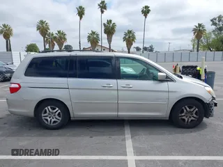 2005 Honda Odyssey EX-L with VIN 5FNRL38745B075486, listed as a IAAI auction lot 42080772 with 197,158 mi miles and . Bid and sale history available at DreamBid. Image 13.