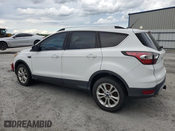 2017 Ford Escape SE z VIN 1FMCU0G99HUA75866, wystawiony jako Copart lot #57274785 z przebiegiem 132 874 mil mil oraz Czysty tytuł • Clean title. Historia ofert i sprzedaży dostępna na DreamBid. Obrazek 2.
