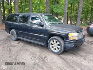 2005 GMC Yukon XL z VIN 1GKFK66U95J249131, wystawiony jako IAAI lot #42525390 z przebiegiem 166 988 mil mil oraz . Historia ofert i sprzedaży dostępna na DreamBid. Obrazek 1.