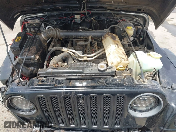 2004 Jeep Wrangler Rubicon z VIN 1J4FA69S84P727716, wystawiony jako IAAI lot #42162129 z przebiegiem 90 844 mil mil oraz . Historia ofert i sprzedaży dostępna na DreamBid. Obrazek 10.