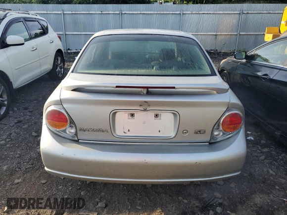2003 Nissan Maxima SE z VIN JN1DA31D83T505047, wystawiony jako Copart lot #57708995 z przebiegiem 110 054 mil mil oraz Czysty tytuł • Clean title. Historia ofert i sprzedaży dostępna na DreamBid. Obrazek 6.