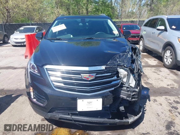 2017 Cadillac XT5 Luxury FWD z VIN 1GYKNBRS7HZ227732, wystawiony jako IAAI lot #42035099 z przebiegiem 76 260 mil mil oraz . Historia ofert i sprzedaży dostępna na DreamBid. Obrazek 12.