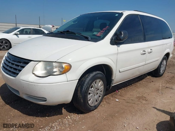 2006 Chrysler Town & Country LWB LX with VIN 2A4GP44RX6R799790, listed as a IAAI auction lot 41890709 with 151,443 mi miles. Bid and sale history available at carsss.com. Image 2.