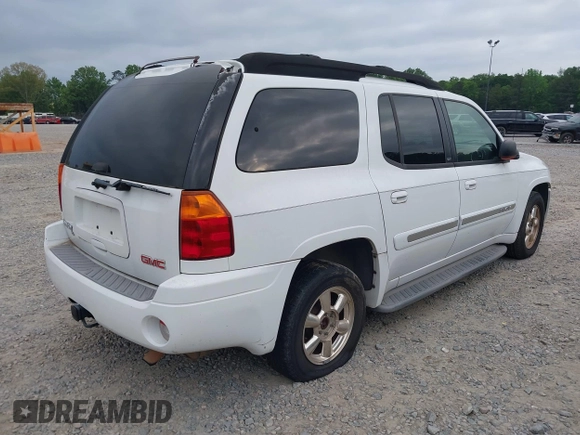 2003 GMC Envoy SLT with VIN 1GKES16S936189719, listed as a IAAI auction lot 42122292 with 289,810 mi miles and . Bid and sale history available at DreamBid. Image 4.