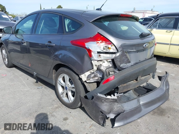 2013 Ford Focus SE with VIN 1FADP3K26DL245456, listed as a IAAI auction lot 41916229 with 164,737 mi miles and . Bid and sale history available at DreamBid. Image 3.