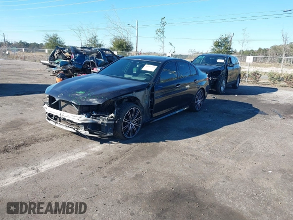 2018 BMW 5 Series M550i xDrive with VIN WBAJB9C57JG463933, listed as a IAAI auction lot 41295711 with 99,173 mi miles and . Bid and sale history available at carsss.com. Image 17.