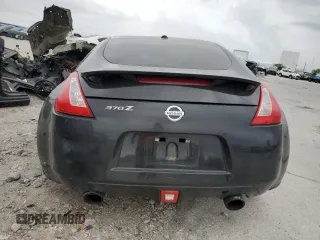 2014 Nissan 370Z Nismo z VIN JN1AZ4EH0EM634461, wystawiony jako Copart lot #53375685 z przebiegiem 171 858 mil mil oraz Szkoda całkowita • Salvage title. Historia ofert i sprzedaży dostępna na DreamBid. Obrazek 6.
