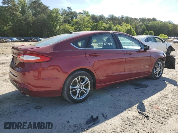 2016 Ford Fusion SE Hybrid with VIN 3FA6P0LU7GR162714, listed as a Copart auction lot 57532635 with 151,633 mi miles and Salvage title. Bid and sale history available at DreamBid. Image 3.