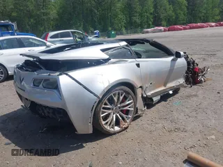 2015 Chevrolet Corvette Z06 2LZ z VIN 1G1YS2D64F5605330, wystawiony jako IAAI lot #42059620 z przebiegiem Nie podano mil oraz . Historia ofert i sprzedaży dostępna na DreamBid. Obrazek 4.