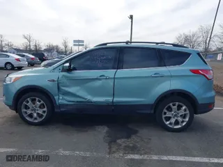 2013 Ford Escape SE with VIN 1FMCU9G96DUD33369, listed as a IAAI auction lot 41613303 with 132,657 mi miles. Bid and sale history available at carsss.com. Image 14.