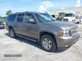 2012 Chevrolet Suburban LT with VIN 1GNSKJE72CR130111, listed as a IAAI auction lot 42699365 with 216,827 mi miles and . Bid and sale history available at DreamBid. Image 1.