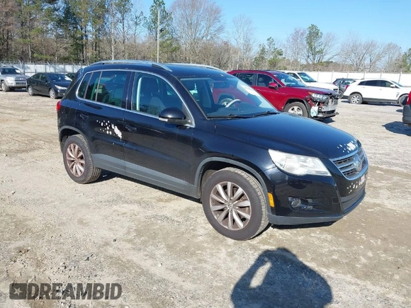 2011 Volkswagen Tiguan SE with VIN WVGBV7AX1BW502770, listed as a IAAI auction lot 41739698 with 160,556 mi miles and . Bid and sale history available at DreamBid. Image 1.