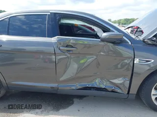2015 Ford Taurus SEL with VIN 1FAHP2E83FG175051, listed as a IAAI auction lot 42357517 with 200,033 mi miles and . Bid and sale history available at DreamBid. Image 6.