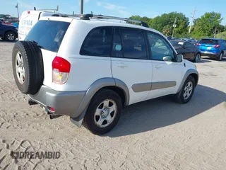 2003 Toyota RAV4 with VIN JTEGH20V730096109, listed as a IAAI auction lot 41903697 with 202,122 mi miles. Bid and sale history available at carsss.com. Image 4.