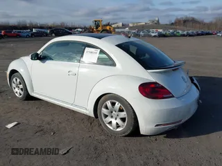 2019 Volkswagen Beetle SE with VIN 3VWJD7AT6KM713525, listed as a IAAI auction lot 41508195 with 73,360 mi miles. Bid and sale history available at carsss.com. Image 3.