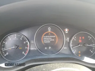 2020 Mazda 3 z VIN 3MZBPABL2LM130247, wystawiony jako Copart lot #58464105 z przebiegiem 54 571 mil mil oraz Szkoda całkowita • Salvage title. Historia ofert i sprzedaży dostępna na DreamBid. Obrazek 9.