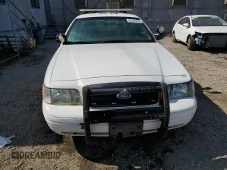 2011 Ford Police Interceptor z VIN 2FABP7BV7BX131779, wystawiony jako Copart lot #59364255 z przebiegiem 118 964 mil mil oraz Czysty tytuł • Clean title. Historia ofert i sprzedaży dostępna na DreamBid. Obrazek 5.