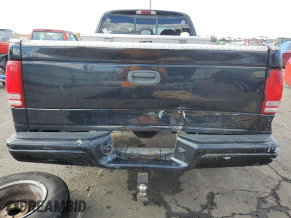 1999 Dodge Dakota SLT with VIN 1B7GG22Y5XS107729, listed as a Copart auction lot 79440034 with 163,718 mi miles and Salvage Title. Bid and sale history available at DreamBid. Image 6.