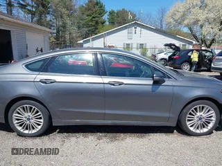 2014 Ford Fusion SE with VIN 3FA6P0H9XER319864, listed as a IAAI auction lot 42063072 with 151,526 mi miles. Bid and sale history available at carsss.com. Image 13.