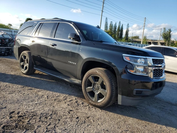 2019 Chevrolet Tahoe LT with VIN 1GNSCBKC0KR266577, listed as a Copart auction lot 79674694 with 75,002 mi miles and Salvage Title. Bid and sale history available at carsss.com. Image 4.
