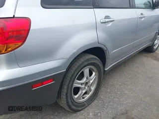 2004 Mitsubishi Outlander LS with VIN JA4LX31F04U038009, listed as a IAAI auction lot 41616254 with 219,527 mi miles. Bid and sale history available at carsss.com. Image 6.