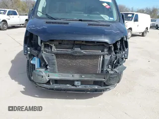2023 Ford Transit Cargo with VIN 1FTYE1Y89PKB02836, listed as a IAAI auction lot 41736881 with 66,915 mi miles. Bid and sale history available at carsss.com. Image 6.