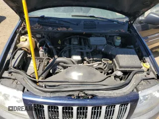 2004 Jeep Grand Cherokee Laredo with VIN 1J4GW48S34C343281, listed as a Copart auction lot 63253325 with 247,697 mi miles and Clean title. Bid and sale history available at DreamBid. Image 12.