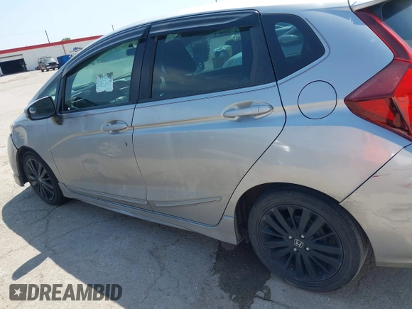 2018 Honda Fit Sport with VIN 3HGGK5G66JM709483, listed as a IAAI auction lot 42030546 with 84,127 mi miles and . Bid and sale history available at DreamBid. Image 14.