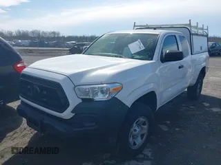 2021 Toyota Tacoma SR with VIN 3TYRX5GN6MT007673, listed as a IAAI auction lot 41691995 with 97,735 mi miles and . Bid and sale history available at DreamBid. Image 2.