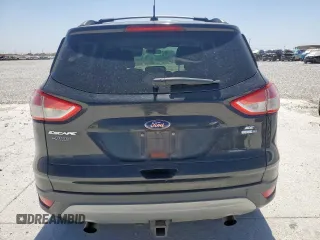 2014 Ford Escape SE z VIN 1FMCU9G91EUE51167, wystawiony jako Copart lot #50017325 z przebiegiem 216 062 mil mil oraz Czysty tytuł • Clean title. Historia ofert i sprzedaży dostępna na DreamBid. Obrazek 6.