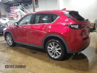 2020 Mazda CX-5 Grand Touring with VIN JM3KFBDM2L1771632, listed as a Copart auction lot 52894945 with 34,926 mi miles and Salvage Title. Bid and sale history available at carsss.com. Image 2.