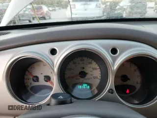 2002 Chrysler PT Cruiser with VIN 3C4FY48B12T373585, listed as a Copart auction lot 77025274 with 131,519 mi miles and Salvage Title. Bid and sale history available at DreamBid. Image 9.