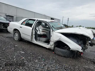 2003 Mercury Grand Marquis LS Premium with VIN 2MEFM75W13X667779, listed as a Copart auction lot 52869985 with 127,506 mi miles and Salvage Title. Bid and sale history available at DreamBid. Image 4.