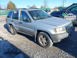 2002 Jeep Grand Cherokee with VIN 1J8GX48N12C255090, listed as a IAAI auction lot 41450524 with 183,915 mi miles and . Bid and sale history available at DreamBid. Image 1.