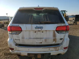 2017 Jeep Grand Cherokee Overland with VIN 1C4RJFCG3HC675125, listed as a Copart auction lot 50142865 with 113,819 mi miles and Salvage Title. Bid and sale history available at carsss.com. Image 6.