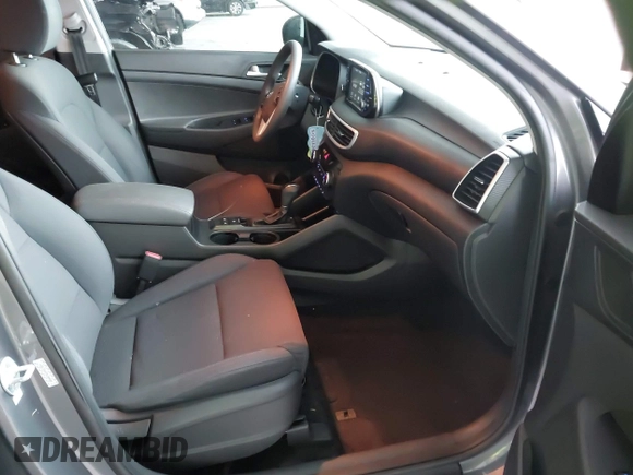 2021 Hyundai Tucson Value z VIN KM8J33A47MU309988, wystawiony jako IAAI lot #41749644 z przebiegiem 61 197 mil mil oraz . Historia ofert i sprzedaży dostępna na DreamBid. Obrazek 5.