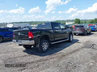 2018 Ram 2500 SLT with VIN 3C6TR5DT2JG166397, listed as a IAAI auction lot 42551256 with 100,040 mi miles and . Bid and sale history available at DreamBid. Image 4.