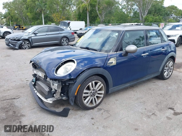 2017 MINI Hardtop 4 Door Cooper with VIN WMWXU1C54H2E19114, listed as a IAAI auction lot 42107266 with 83,524 mi miles and . Bid and sale history available at DreamBid. Image 18.